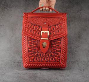 Hand tooled crossbody briefcase, 