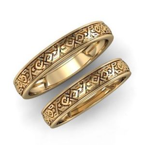 Обручальные золотые кольца с резным орнаментом